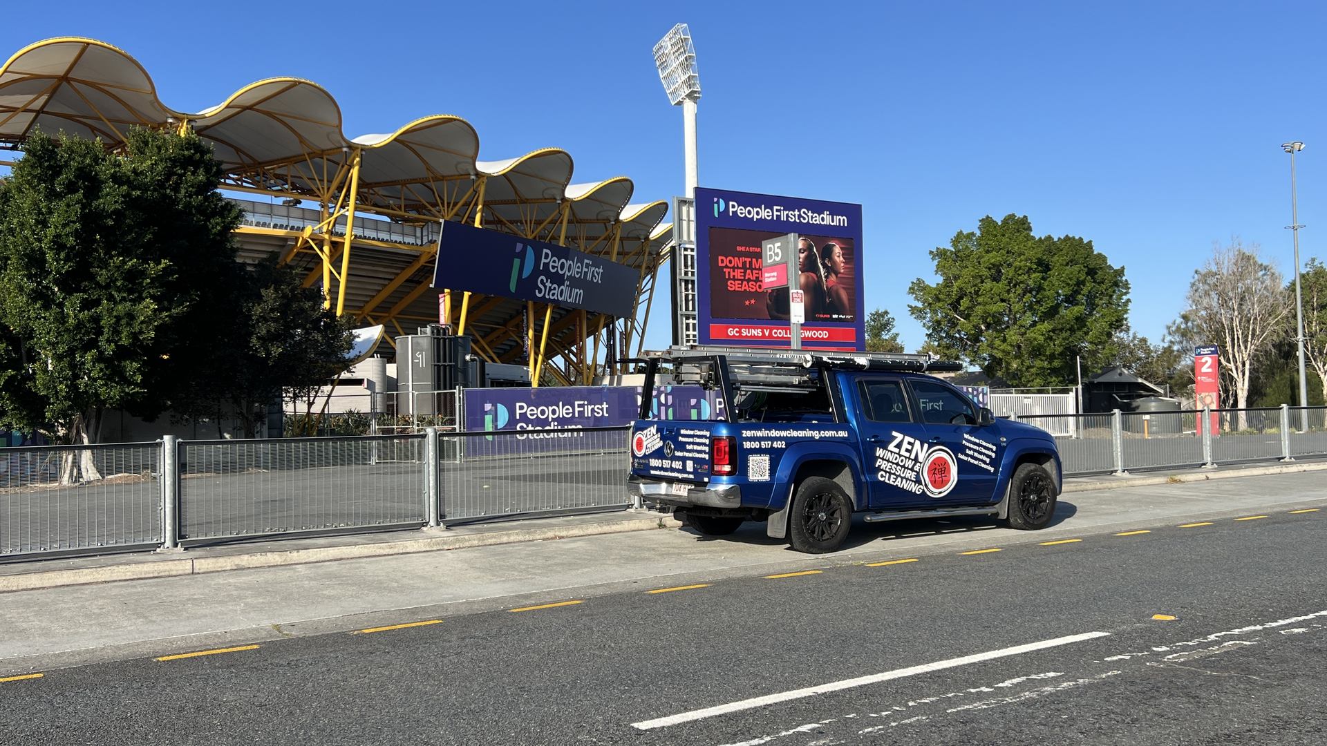 Zen Window Cleaning ute outside People First Stadium in Carrara
