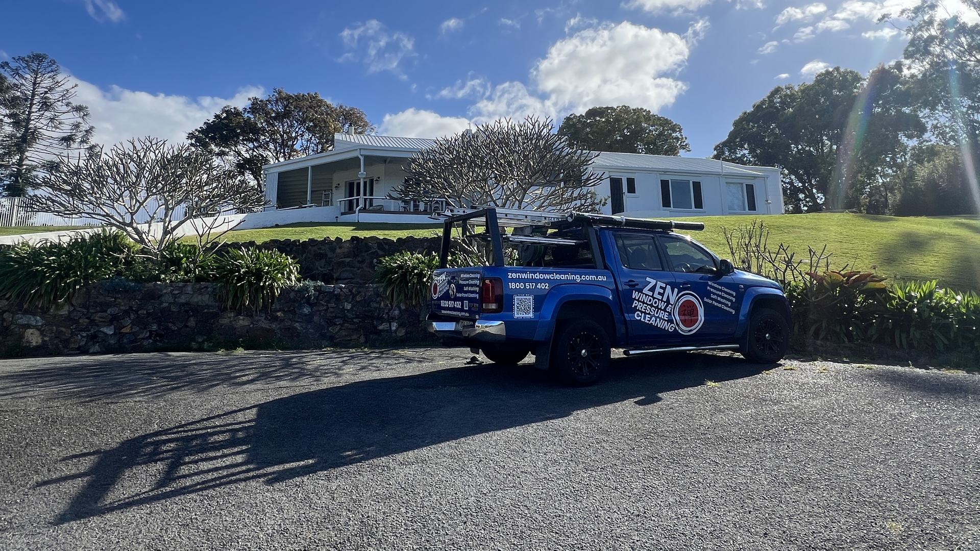 Zen Window Cleaning ute at an acreage window cleaning job in Currumbin Valley