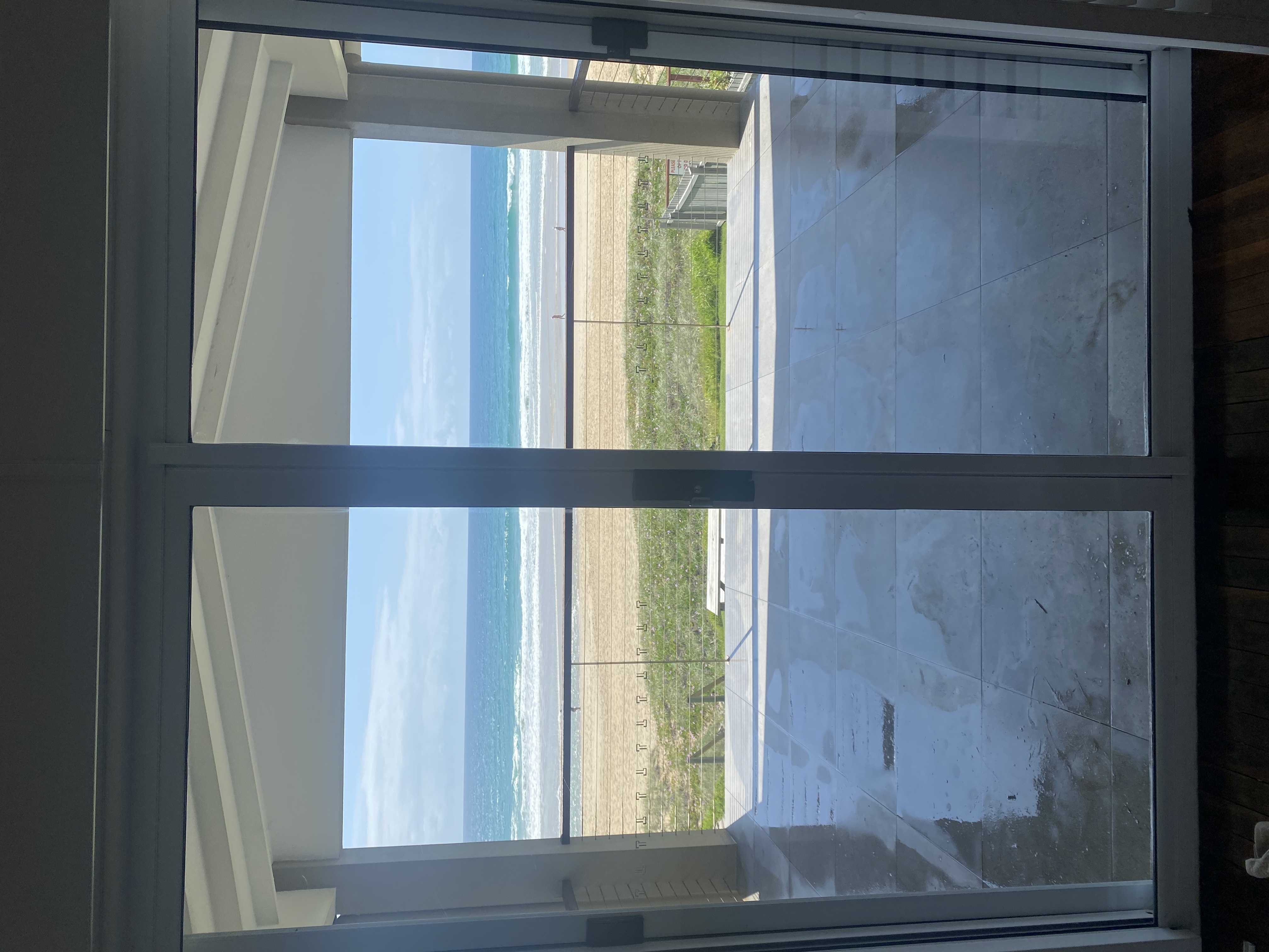 Crystal clear beachfront windows with unobstructed ocean views on Gold Coast property